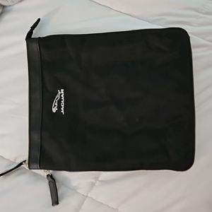Jaguar zip pouch with zipper extender